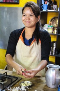 “I like cooking…. and I like eating… It makes me happy,” explains Social Tours chef, Sakuntaia Rokka. Photo by Victoria Nechodomu.